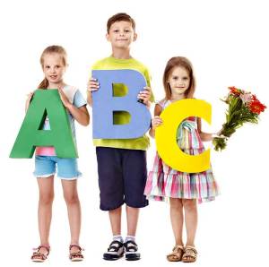 Children holding abc.
